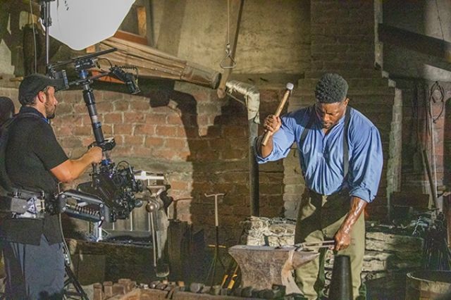 Creating black history video featuring a blacksmith