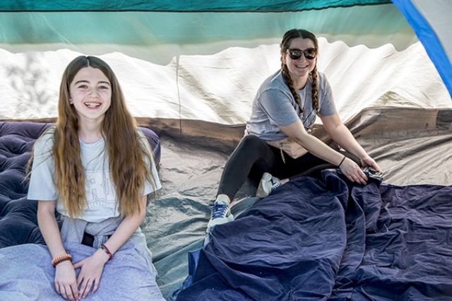 Young ladies in a tent for a campout