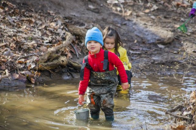 children playing in waterway