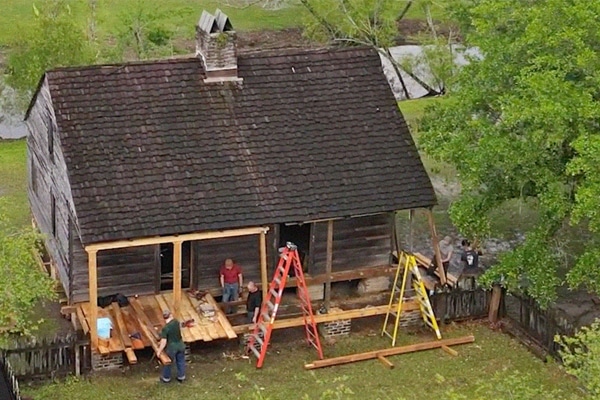 Conner Prairie crew helping others preserve a historic building