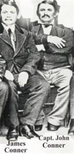 Old black and white photo of James and John Conner sitting in formal attire.