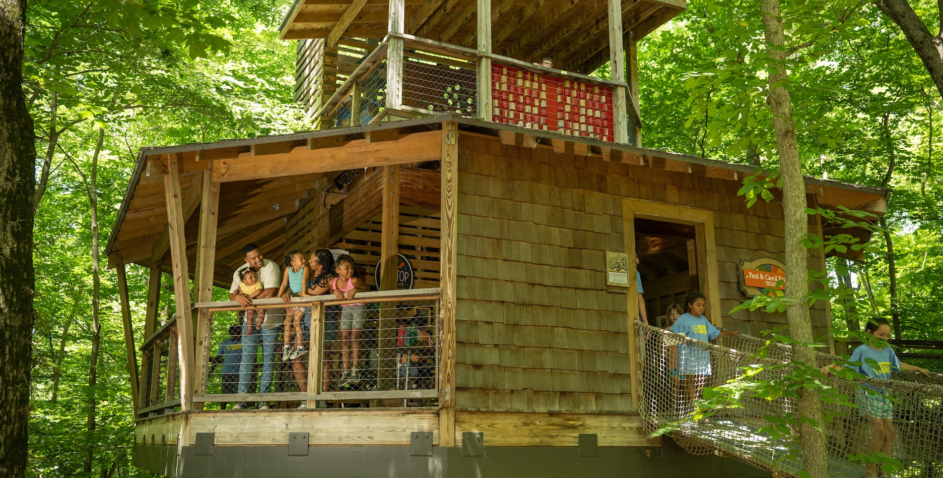 Photo of families in the treetop outpost